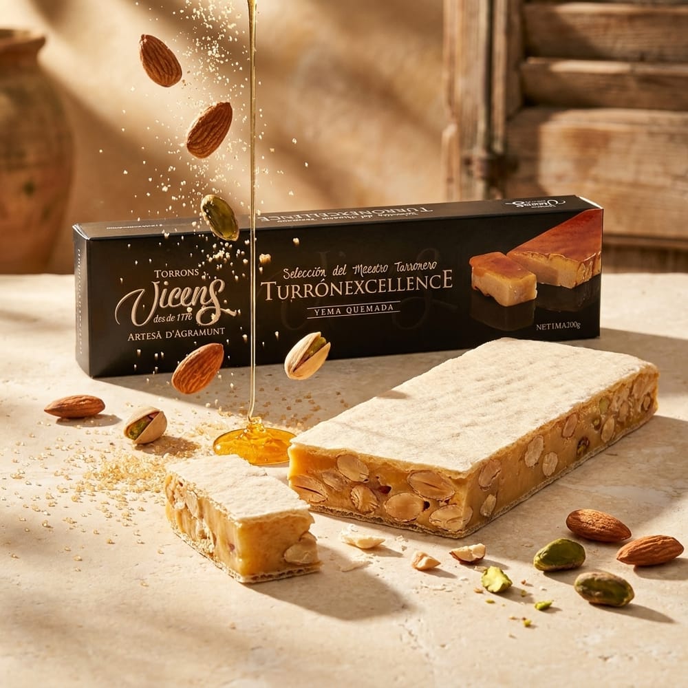 Черна кутия Torrons Vicens от Аграмунт и две блокчета турон с цели бадеми в разреза, покрити с тънка облатка