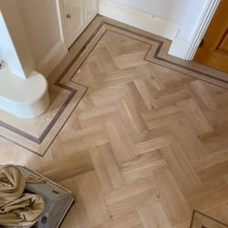 sanding herringbone parquet floor