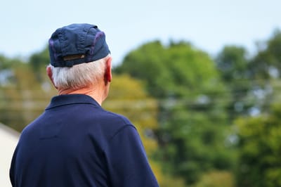 men staring in landscape