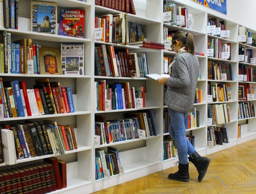 library girl reading book