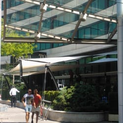 Side angle of the architectural structure showing layered tensioned membranes