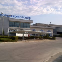 Wide view of the textile parking canopy installed in front of Dominov Konsumativ’s administrative building in Plovdiv.