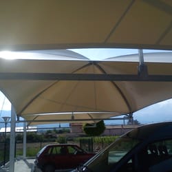 Underside view of the dome-shaped canopy at Uva Nestum, showing supporting arches.